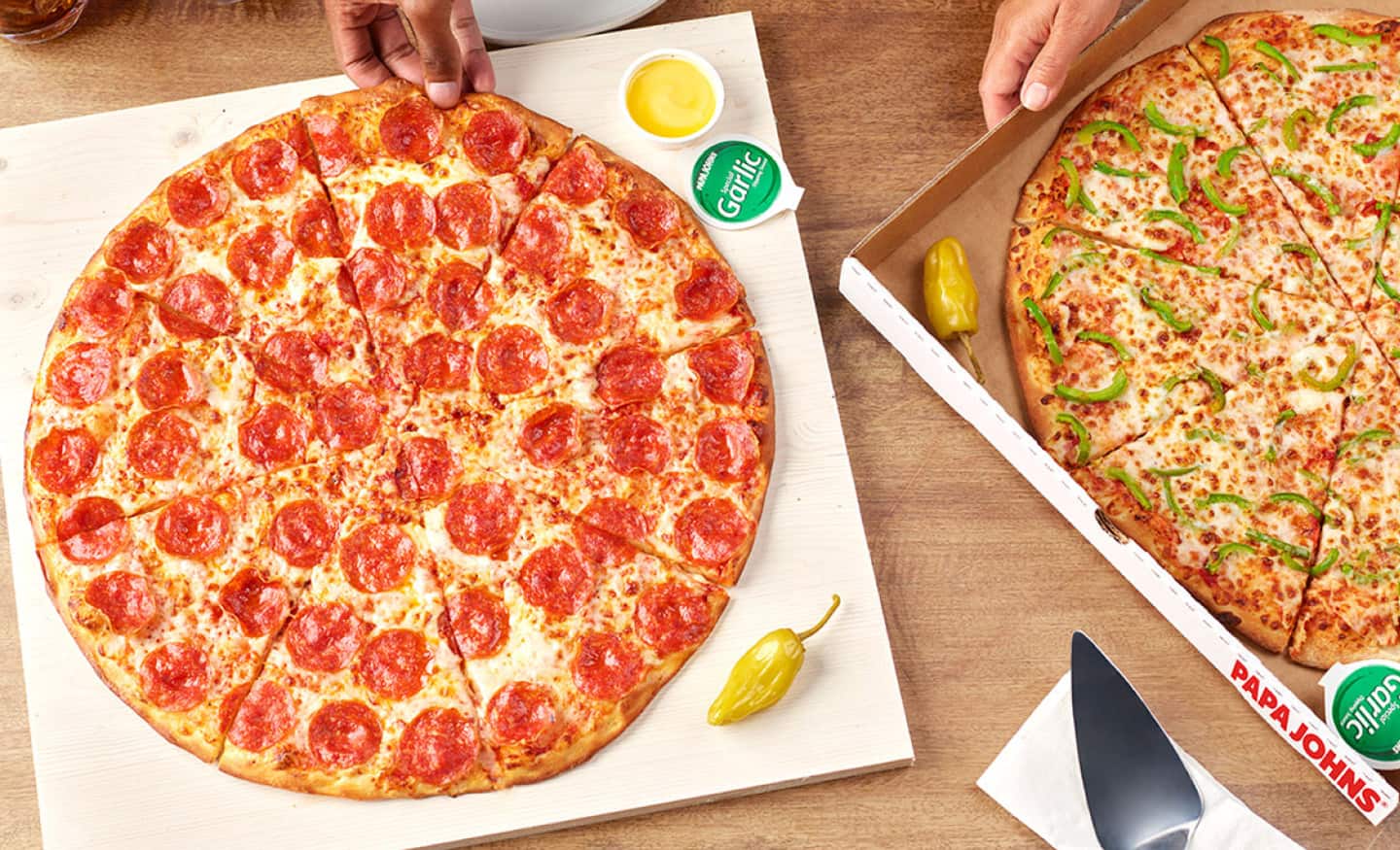Two pizzas side by side